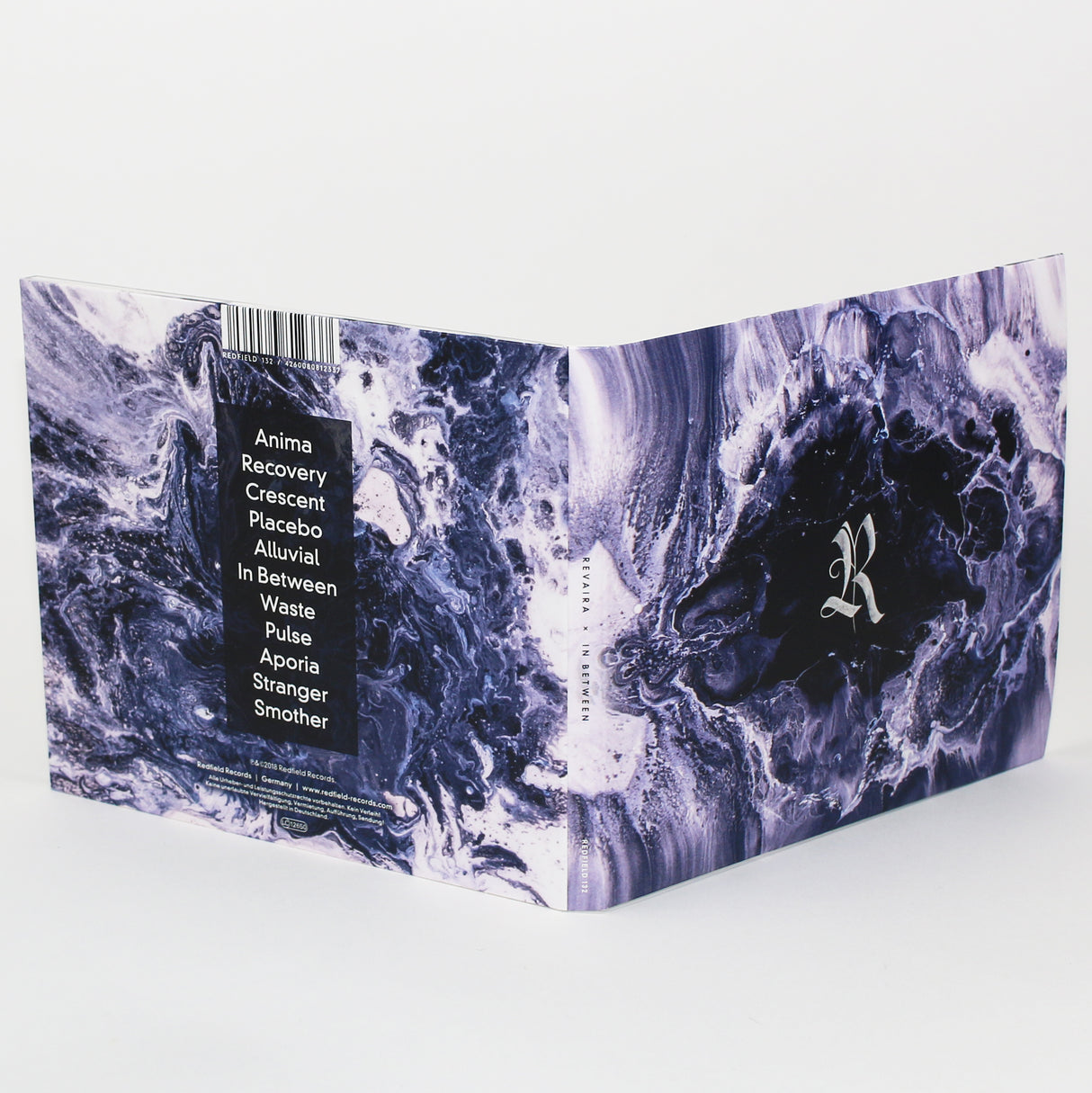Revaira - In Between - CD (2018) - Redfield Records